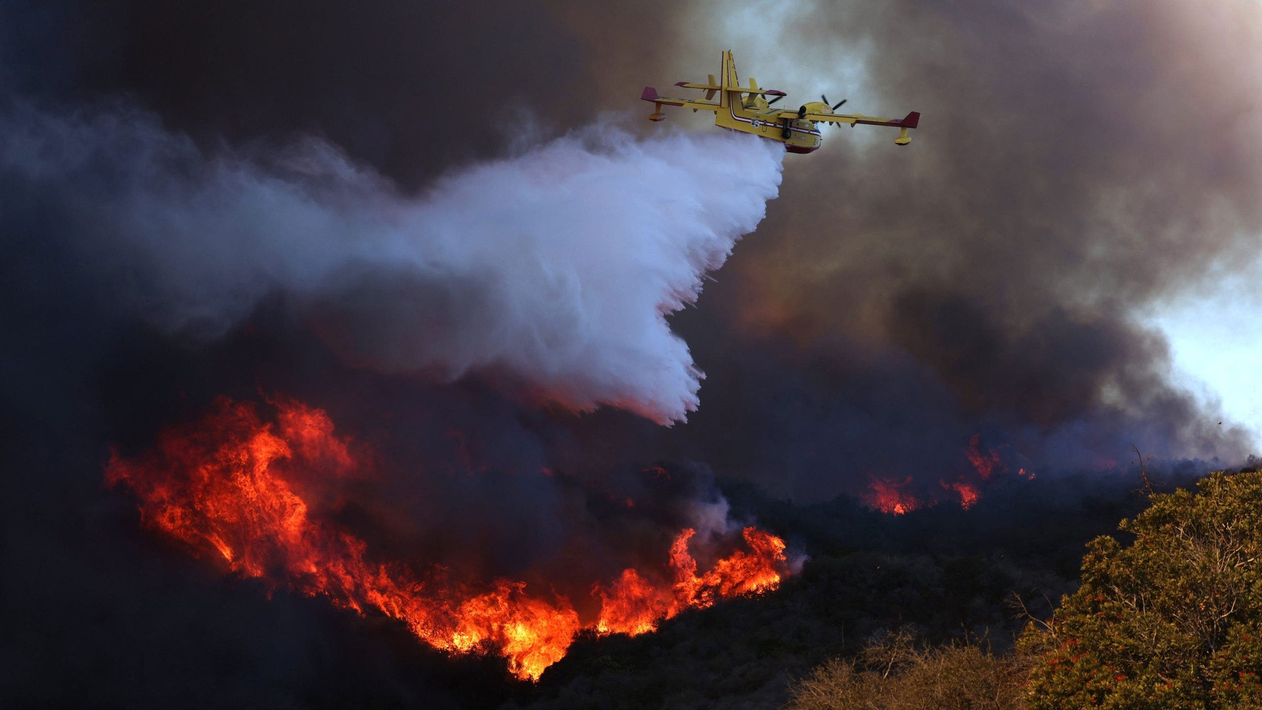 Los Angeles area college campuses shut down as fires spread